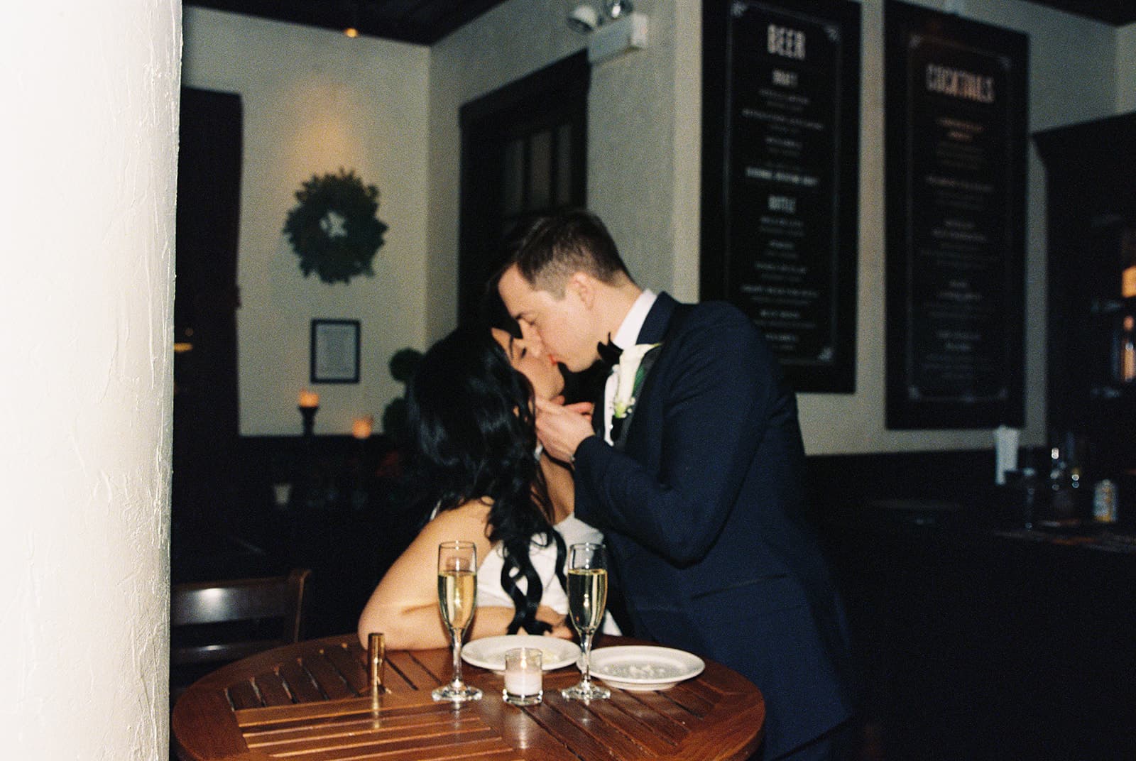 First dance under string lights at an outdoor reception