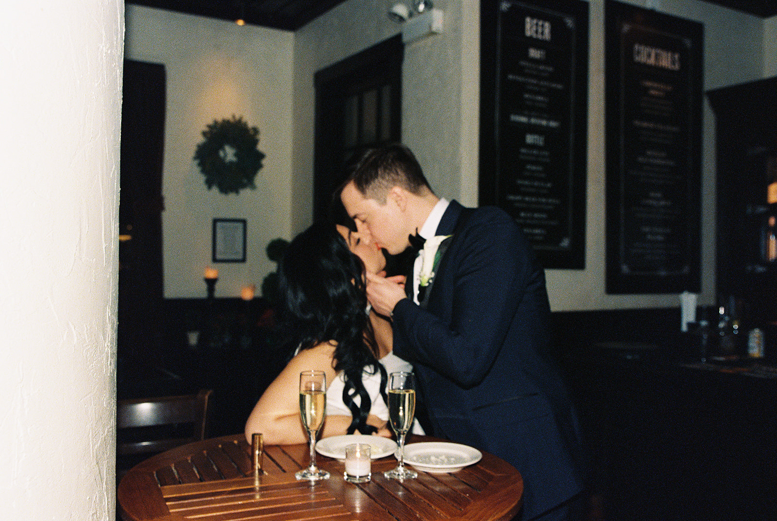 First dance under string lights at an outdoor reception